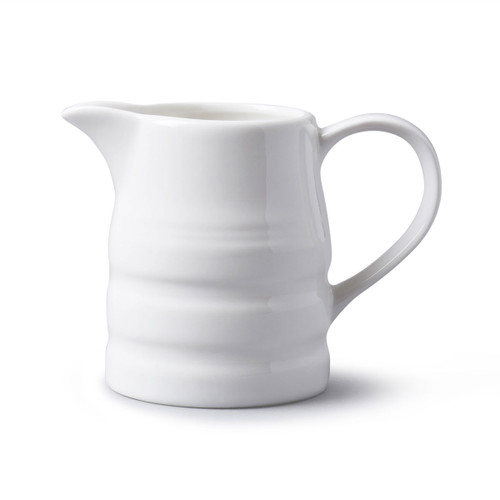 A white porcelain churn jug on a white background.