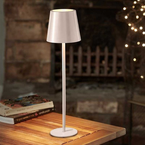 Cream Smart Garden Turin lamp on a side table.