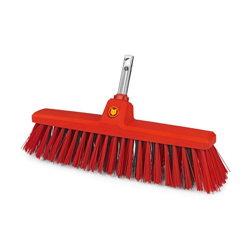 A view of a red garden broom head on a white background