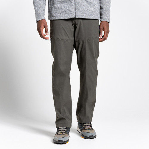 A front view of a man wearing dark khaki walking trousers