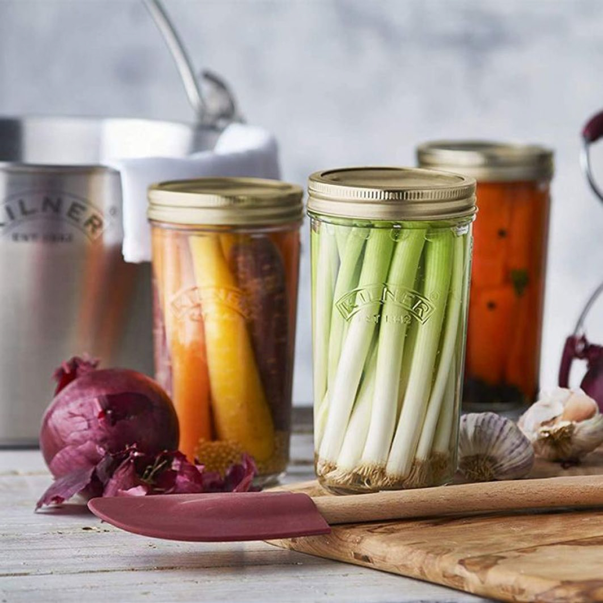 preserving glass jars with vegetables pickling