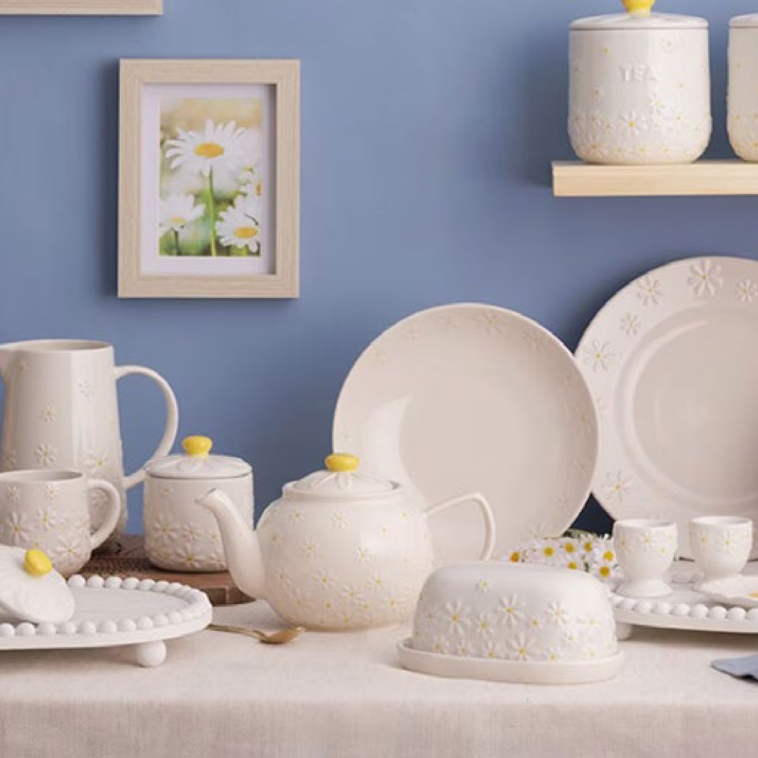 A collection of daisy patterned table wear