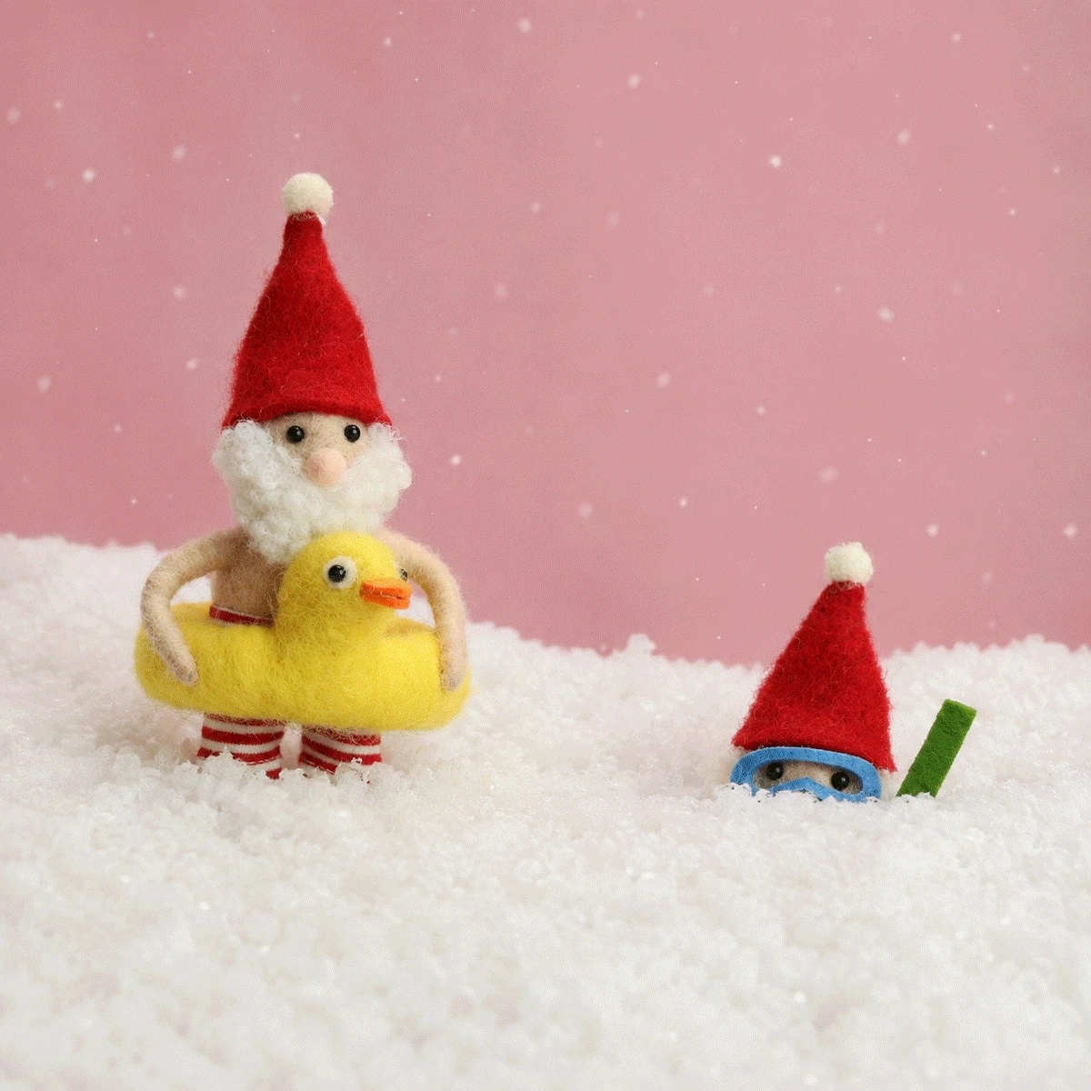felt santa decorations gif showing santa in snorkle and santa with a rubber dingy