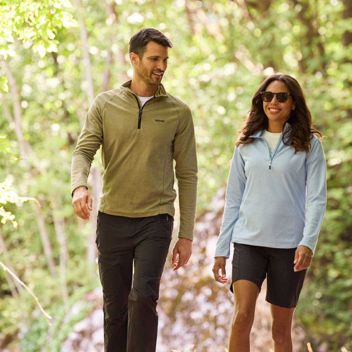 Man and women walking wearing Regatta fleeces