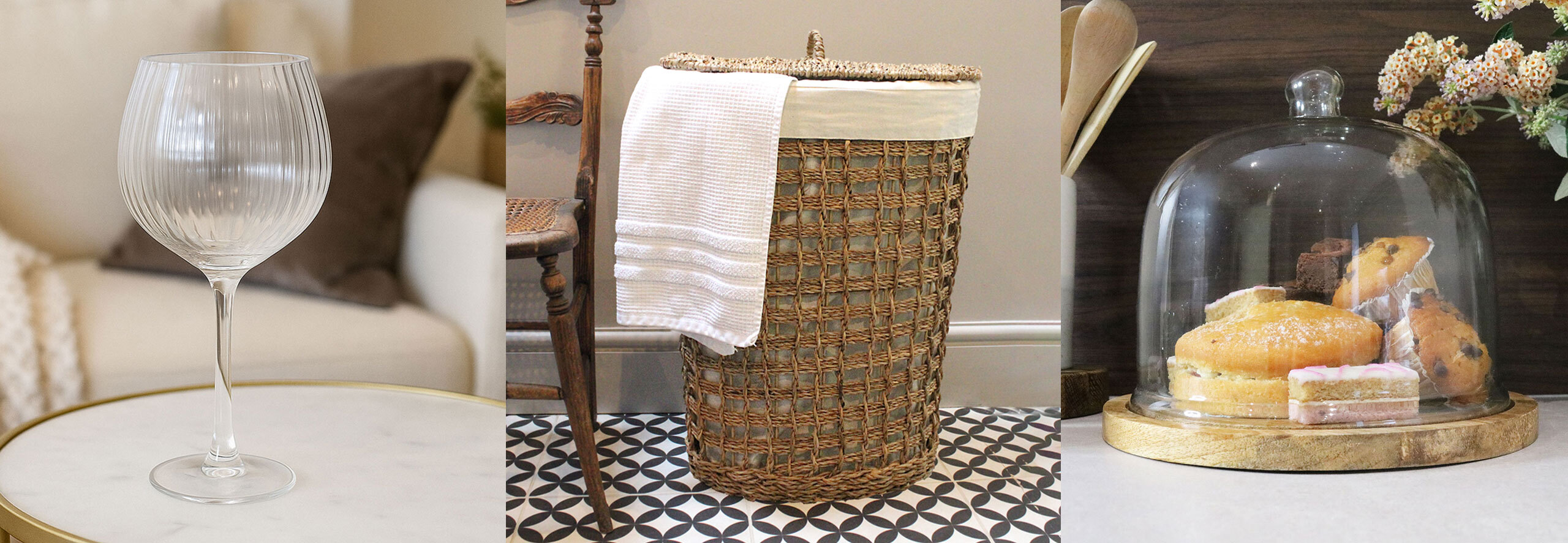 A banner showcasing a ribbed gin glass, a seagrass laundry basket and a cake dome with a wooden base.