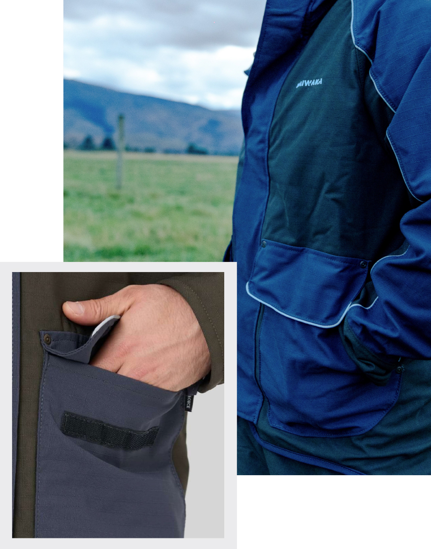 Person wearing a blue jacket with front pockets in a grassy field with mountains in the background. Inset shows a hand reaching into a pocket.