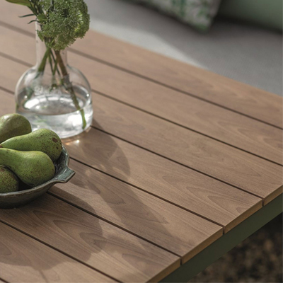 A view of a wooden table top on a Bramblecrest garden furniture set