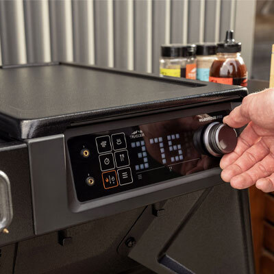 a close up of the temperature scale on a bbq