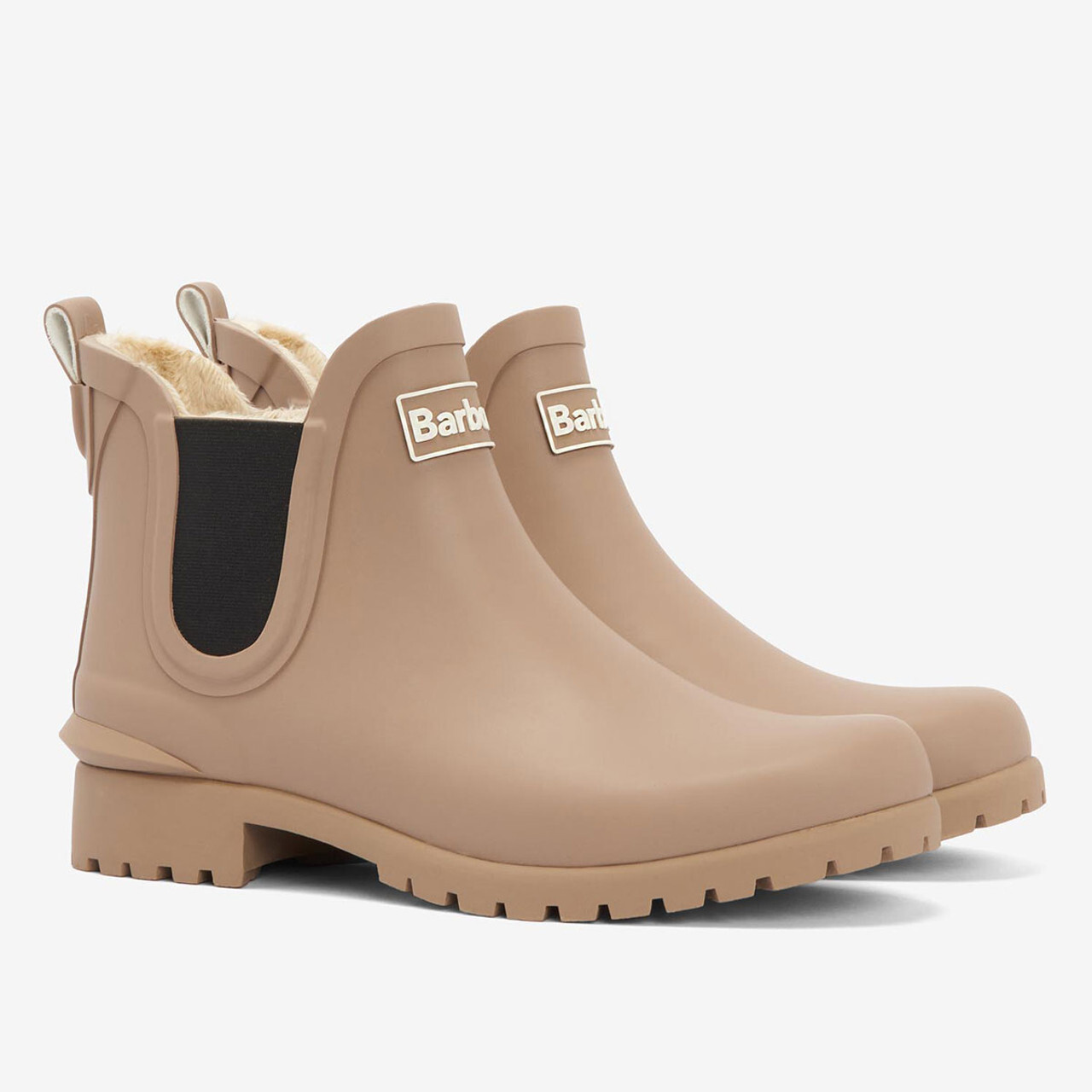 A pair of neutral coloured short Barbour wellington boots.
