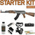 Lancer Tactical Ak-47 Complete Starter Kit. Image shows the gun, BB's, Battery, Charger, Goggles, Face Mask, and padded gun bag