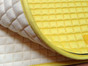 Yellow All-Purpose English Saddle Pad with black piping.