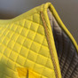Zoom to View:  Yellow All-Purpose English Saddle Pad with Gold #25 accent rope/cord.