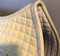 Zoom to view:  Champagne Butter Cream Dressage Saddle Pad with #41 Light Silver Accent Rope/Cord.