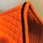 Zoom to View Orange Dressage Saddle Pad Shown here with #7 Black Accent Rope/Cord.