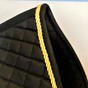 Zoom to View:  Black All-Purpose Saddle Pad with #25 Bright Gold Accent Rope/Cord.