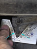 Nut between two lines on the WrenchSizer; the larger size, 1/2 inch, is the right wrench