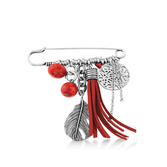 Magical array of semi-precious coral, burnished silver and suede elements combined on a designer pin