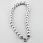 Luminescent silver bead necklace. Finished with a signoretti clasp.