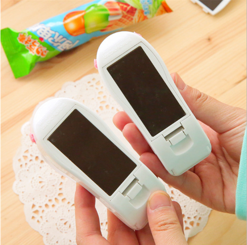 Creative household portable mini plastic bag sealing machine small hand pressure heat sealing machine plastic sealing machine