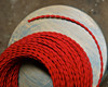 red twisted cloth covered 2 wire