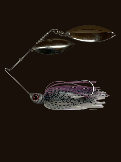 Michael Murphy is a certified Fisheries Biologist, has fished full-time and competitively for the past 10 years across the country on both the BASS and FLW trails, and is a United States Coast Guard licensed full-time Largemouth Bass guide on Lake Murray.  With his in-depth understanding of fish behavior, Michael has a reputation as a power fisherman, and one of his favorite tools to use when on the water is a spinnerbait.  
 
The Michael Murphy High Class Signature Series Spinnerbait is exactly that,.. High Class, but yet still affordable.  These spinnerbaits are a blend of Michael's experience and expertise blended with Greenfish Tackle's high quality components.  As a result you have a spinnerbait with all the sought after features to maximize fish catches and efficiency; a well balanced Spinnerbait that is hand tied, with an "R" bend, high quality multi-colored blended skirts not found in typical mass produced spinnerbait, with blades that are perfectly spaced, sized correctly to the size of the spinnerbait, and positioned on the highest grade ball-bearing swivels, fitted on a spinnerbait with the correct guage wire and high quality, wider than normal sized hook for catching bigger than normal sized fish.  Ultimately, a spinnerbait nearly perfect that is ready to fish right out of the package.
