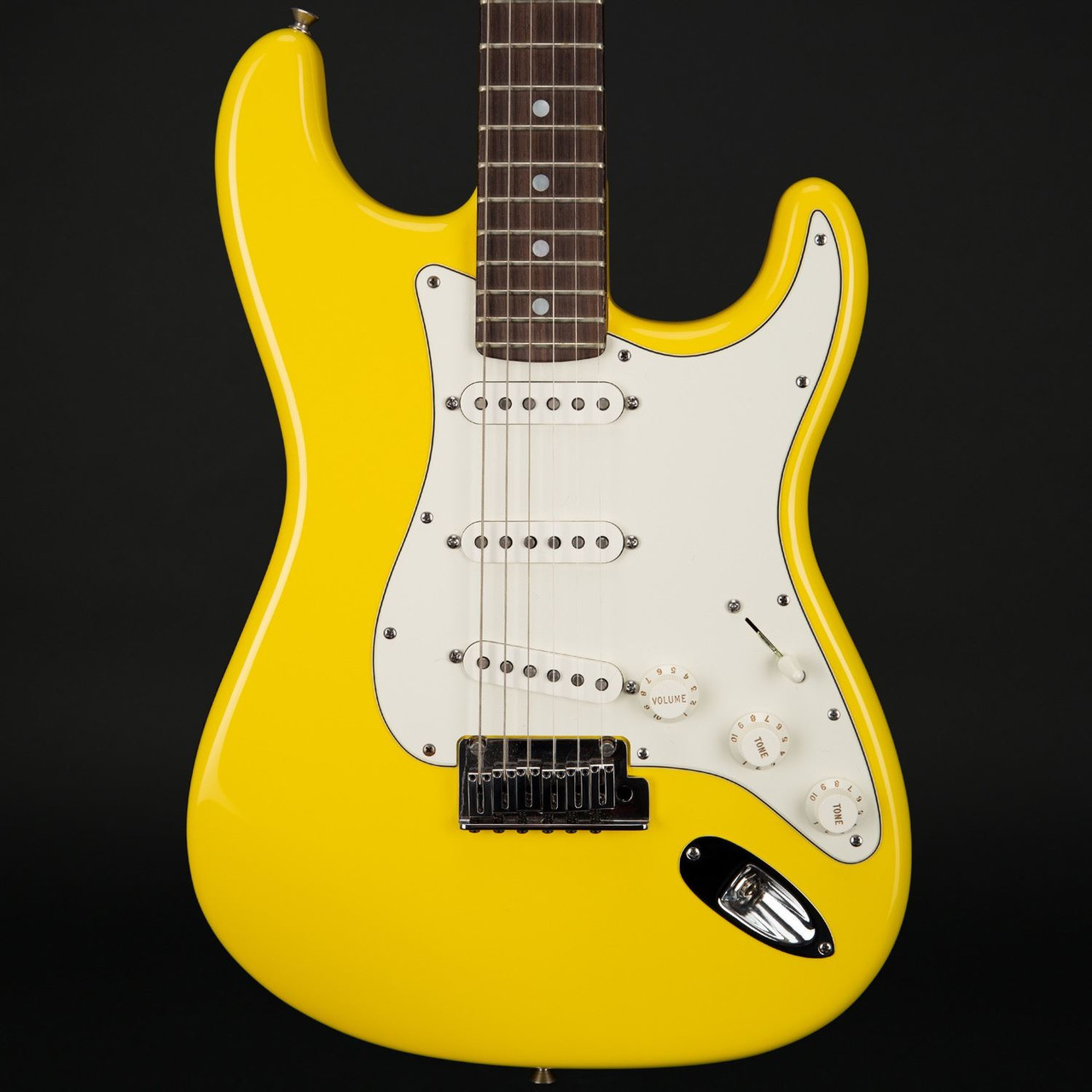 yellow and black stratocaster