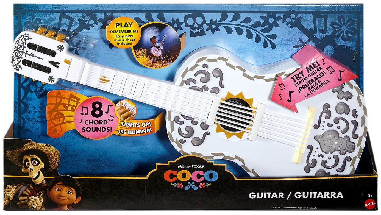 white toy guitar