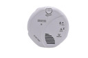 Mini Gadgets Hard Wired Functioning Smoke Detector WiFi Nanny 4K UHD Security Camera (Hard Wired), close-up of a white smoke and carbon monoxide detector with various icons and labels.