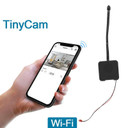 TinyCam, 1080P HD Duel Band 2.5 and 5.85 GHz WiFi Camera Module with Live Streaming Audio and Video, 1500mAh Battery, handheld smartphone displaying live camera feed.