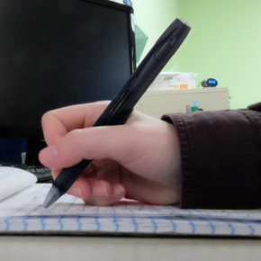 Custom Wifi Pen camera with 1080P HD Camera, Video & Photo Recorder, Ball Point Pen, being used to write on a notebook.