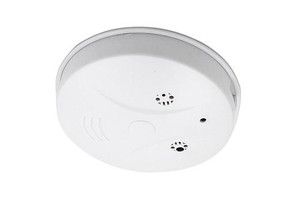Gio Enterprises AC Power Dummy Smoke Detector WiFi with DVR Surveillance and Security Camera, wireless streaming video compatible with PC and tablet, includes 4-hour battery and AC power cord, ceiling-mounted design.