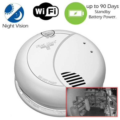 Csc Electronics Battery Operated Dummy Wi-Fi Smoke Detector Security Camera with Night Vision and Up to 90 Day Standby Battery Power, displaying night vision view of a storage room.