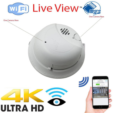 CSL Electronics Hard Wired Dual Camera Dummy Smoke Detector Nanny Security Camera DVR with Wireless Streaming Video for iPhone, Tablet and More, image of a white smoke detector with labeled camera spots, WiFi and live view icons, and a smartphone showing remote monitoring.