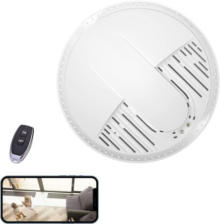 Battery Powered Dummy Smoke Detectors WiFi Security Camera Side View with Night Vision and Long Battery Life, including a remote control and a smartphone showing monitoring footage.