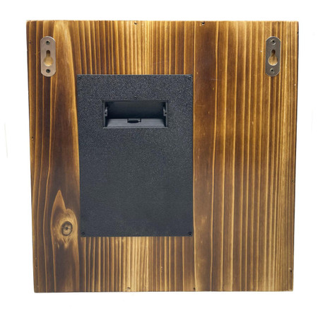 Xtreme Life 4K Wood Frame Hidden Security Camera, mounted on a wooden surface with battery compartment and concealed design for home security.