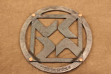 iron trivet with black butte ranch logo