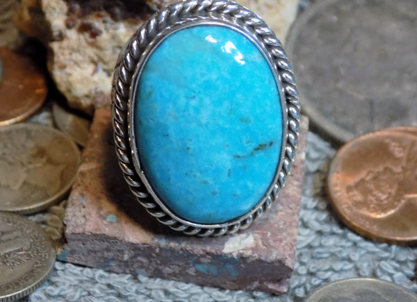 Navajo Russell Sam
Kingman Arizona Turquoise Gemstone
www.SDavidJewelry.com