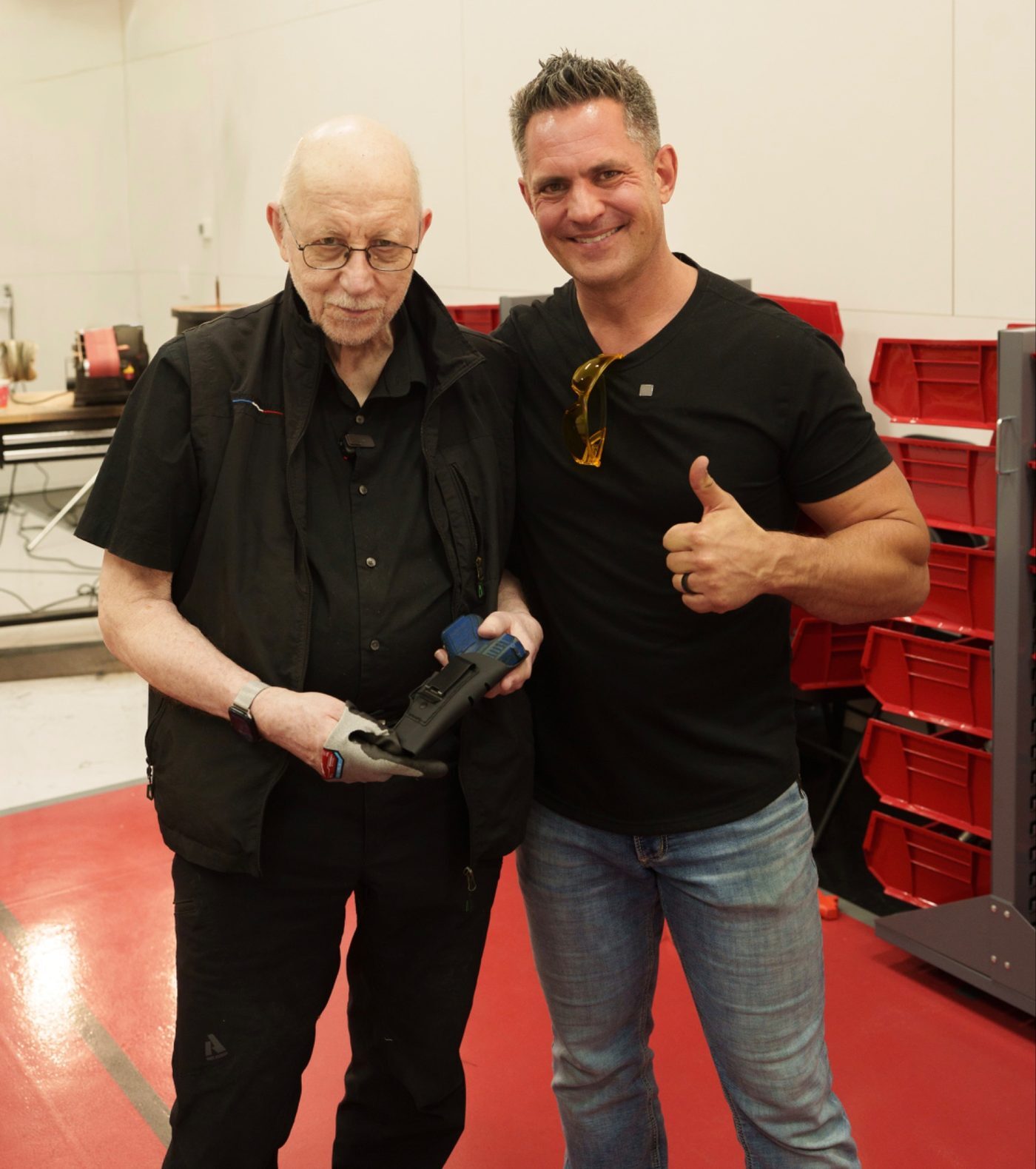 Kevin standing with FIST Holsters founder Jim Murnak