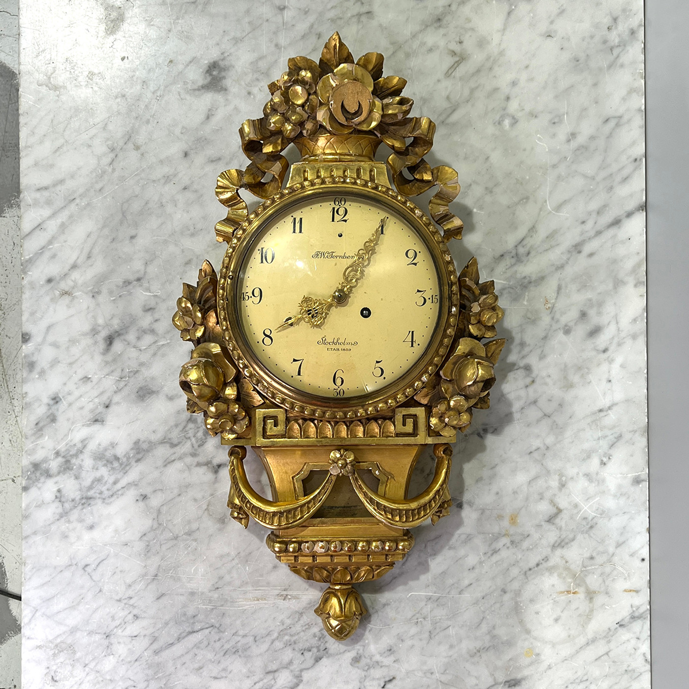 Swedish Neoclassical style giltwood cartel clock