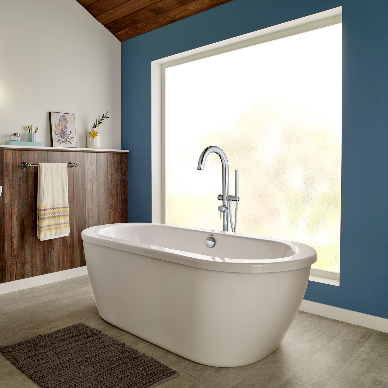 Contemporary Round Freestanding Tub Filler with Hand Shower in Polished Chrome