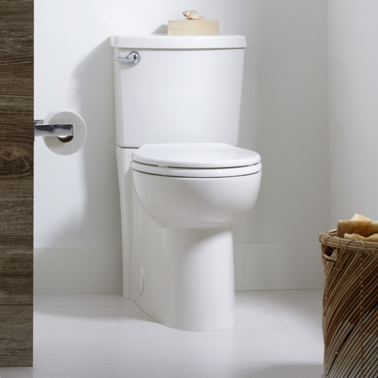 American Standard 2989.101.020 Right-Height Elongated 1.28 GPF Toilet with Seat; 12-in Rough-In; and Concealed Trapway