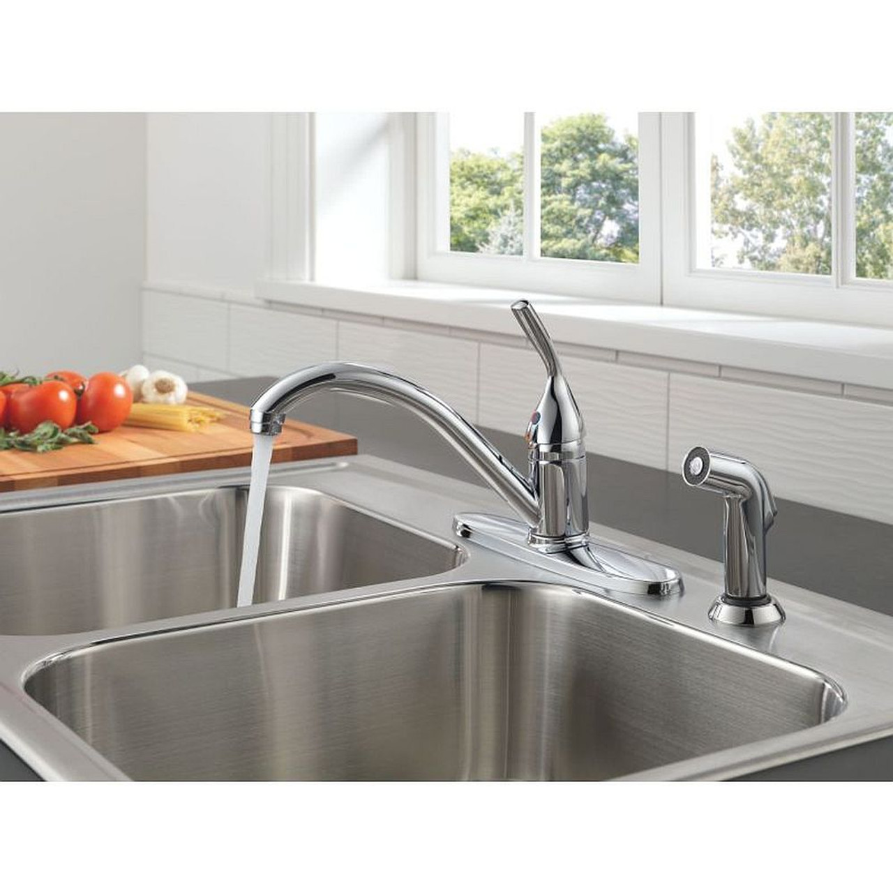 Delta 400-DST Single Handle Kitchen Faucet with Spray in Polished Chrome