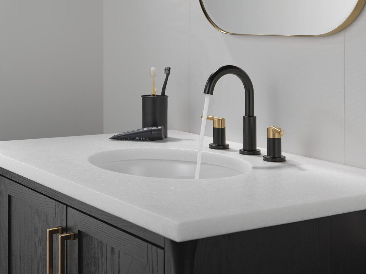 Delta 35749LF-GZ Nicoli Two Handle Widespread Bathroom Faucet, Matte Black and Champagne Bronze