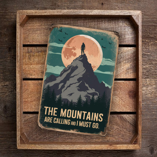 Vintage-Style "The Mountains Are Calling And I Must Go" Metal Sign - Silhouette On Mountain Peak With Orange Moon 8x12