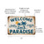 Vintage Style Welcome Sign - "Welcome To Our Little Piece Of Paradise" 8"x 12" Distressed Look Outdoor Sign With Sun & Palm Trees