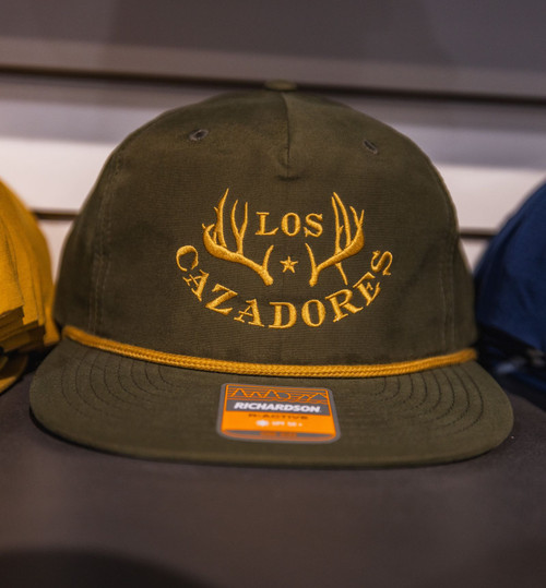 Los Cazadores Original Horns Logo Rope Cap Variant Color Loden and Gold. Front View.