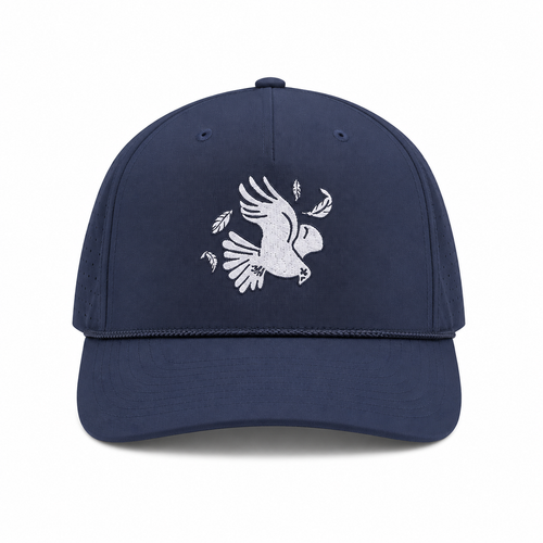 Front view of the navy Los Cazadores performance rope cap with white bird embroidery on a clean white background.