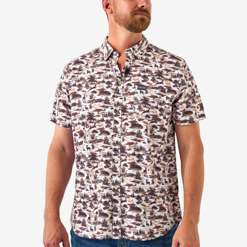 Man wearing the Burlebo performance button up in a white, navy and brown novelty print