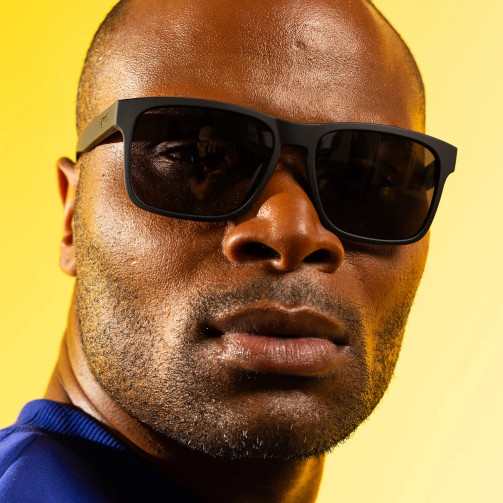 GOODR GRAND G FRAME SUNGLASSES. VARIANT NAME - GRIM REAPER'S SPRING FLING. SEEN ON MODEL.