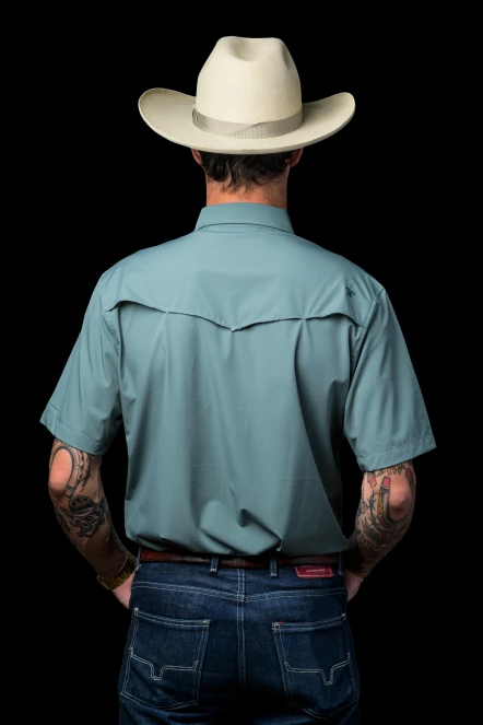 Ferrell CORE men's aqua short sleeve western snap shirt with pearl snaps and chest pockets, back view on black background